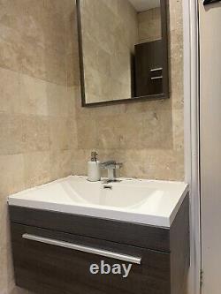 Bathroom vanity unit with sink used