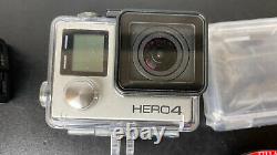 GoPro Hero4 Black Camcorder plus 4 Batteries Twin Charger Mounting Accessories