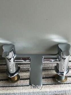 Roca wall mounted basin & vanity unit with Bristan mono tap matching bath tap