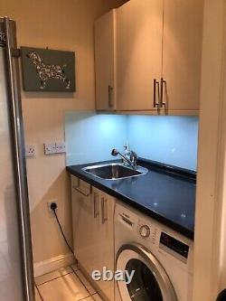 Second hand / used painted kitchen cabinets with Stoves induction hob