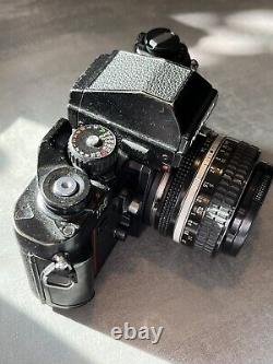 Corps de l'appareil photo reflex argentique Nikon F3 Noir avec objectif Nikkor 50mm F1.4 AI monture F.