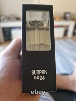 Sunpak GX24 Flash monté sur sabot avec boîte de synchronisation et câble utilisé.